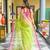 Green pure muslin silk saree with pink border and woven motifs