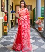 Red pure muslin silk saree with self border and woven motifs