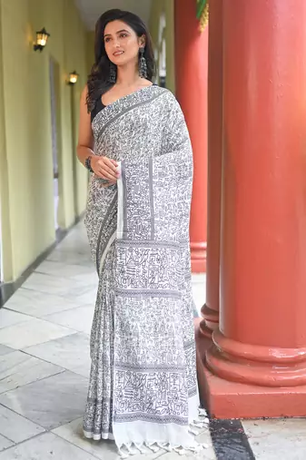 Offwhite cotton linen saree with black warli art