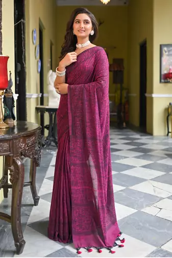 Magenta cotton linen saree with black warli art