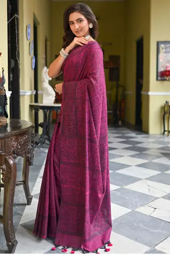 Magenta cotton linen saree with black warli art