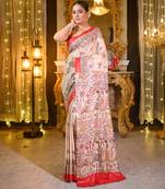 Beige bishnupuri ghicha tussar silk saree with multicolor madhubani hand painted design