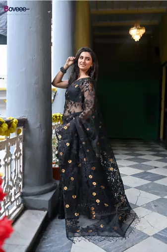 Black pure muslin silk saree with self leaf woven motifs and golden flower butis