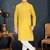 yellow cotton kids kurta with subtle stripe work detail
