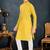 yellow cotton kids kurta with subtle stripe work detail