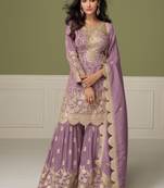 Light purple heavy shimmer silk full stitched free size upto 42 gharara suits