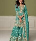 Light blue heavy shimmer silk full stitched free size upto 42 gharara suits
