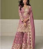 Light pink heavy shimmer silk full stitched free size upto 42 gharara suits