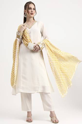 mustard yellow and off white mul chanderi silk anarkali kurta trouser dupatta set