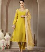 mustard yellow mul chanderi silk embroidery a-line kurta trouser dupatta set