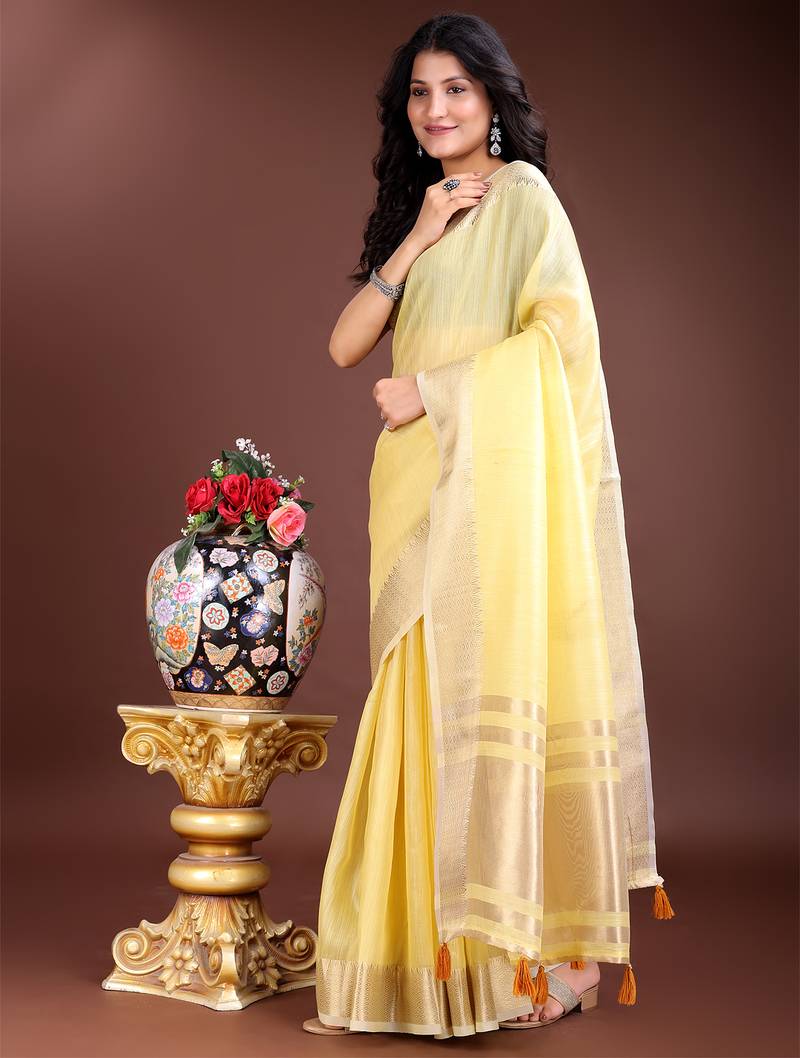 yellow cotton with golden border and zari weaving saree with blouse