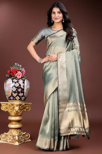 sea green organza with thread work and zari weaving saree with blouse