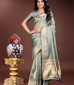 sea green organza with thread work and zari weaving saree with blouse