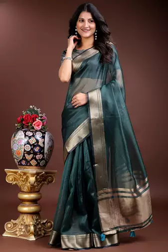 sea green organza with thread work and zari weaving saree with blouse