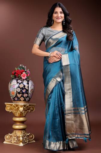 sea green organza with thread work and zari weaving saree with blouse