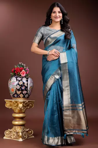 sea green organza with thread work and zari weaving saree with blouse
