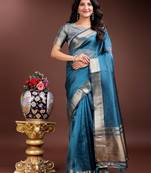 sea green organza with thread work and zari weaving saree with blouse