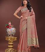 peach organza with thread work and zari weaving saree with blouse