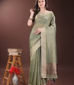 green organza with thread work and zari weaving saree with blouse