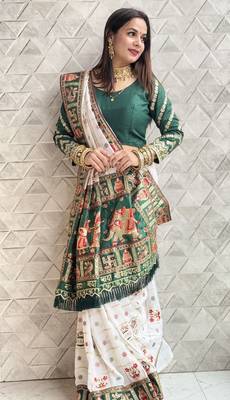 white silk saree with embroidered lace and latkan details 1