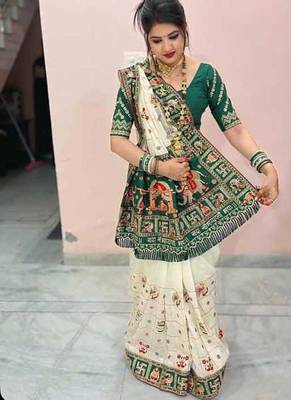 white silk saree with embroidered lace and latkan details 3