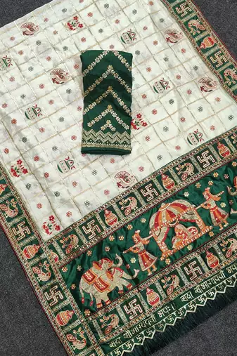 white silk saree with embroidered lace and latkan details