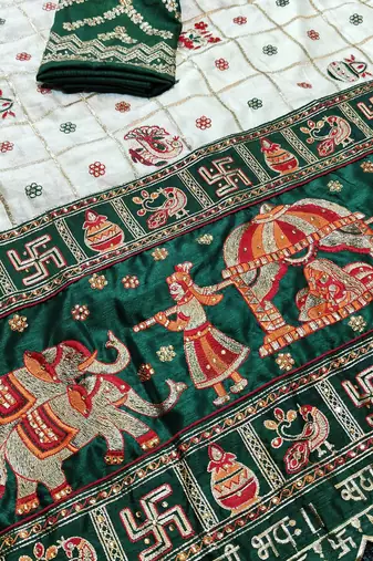 white silk saree with embroidered lace and latkan details
