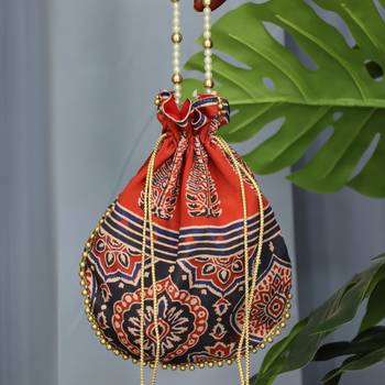 Orange pearl handle designer batwa 2