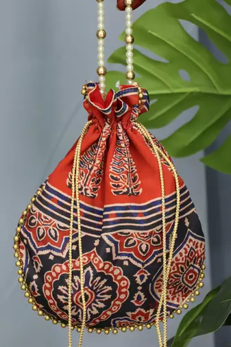 Orange pearl handle designer batwa