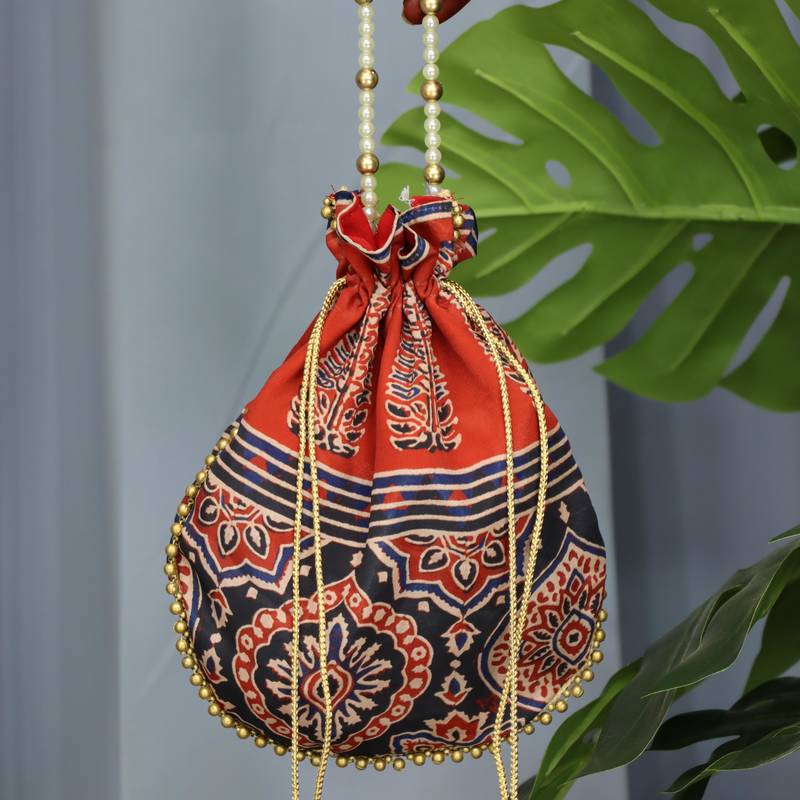 Orange pearl handle designer batwa