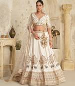 White Lehenga with Intricate Elephant Zari Work