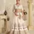 White Lehenga with Intricate Elephant Zari Work