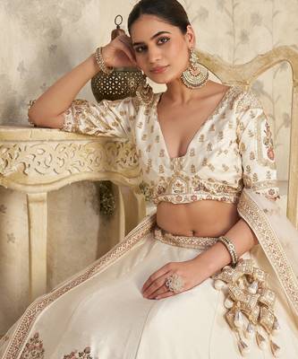 White Lehenga with Intricate Elephant Zari Work 3