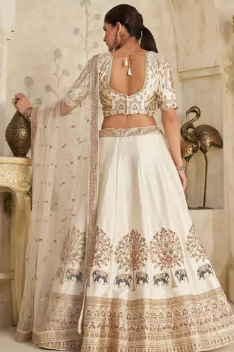 White Lehenga with Intricate Elephant Zari Work