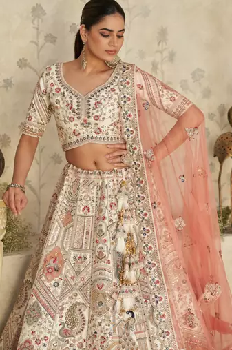 Intricately Embroidered Cream Zari Lehenga with Royal Motifs