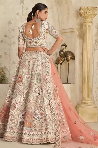 Intricately Embroidered Cream Zari Lehenga with Royal Motifs
