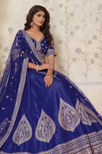 Royal Purpple bridal lehenga with zari work