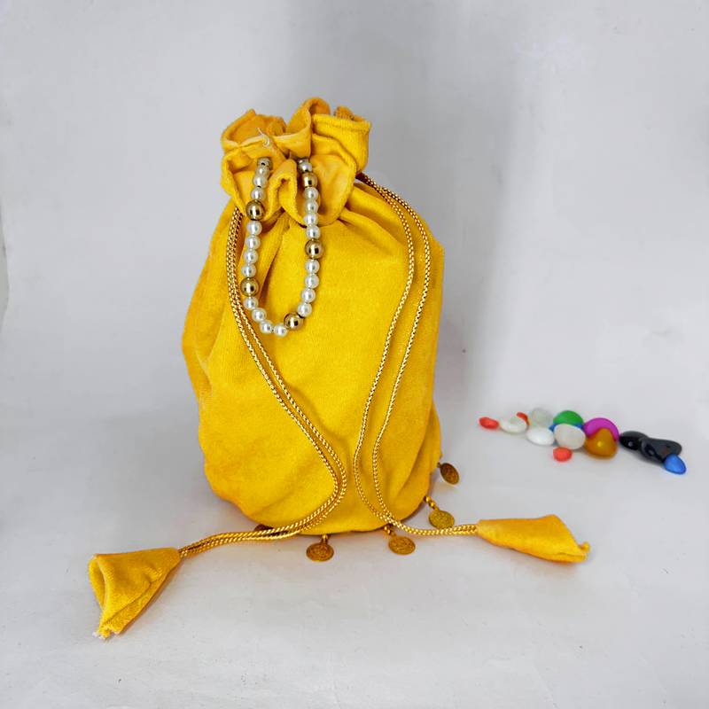 Yellow plain with sikka zumkha lace on bottom round potli