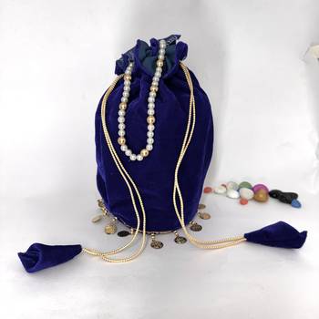 Neavy-blue plain with sikka zumkha lace on bottom round potli 2