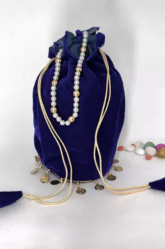 Neavy-blue plain with sikka zumkha lace on bottom round potli
