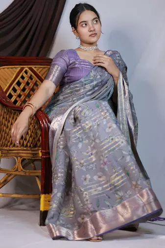 green floral print zari woven border crepe saree with unstiched blouse piece