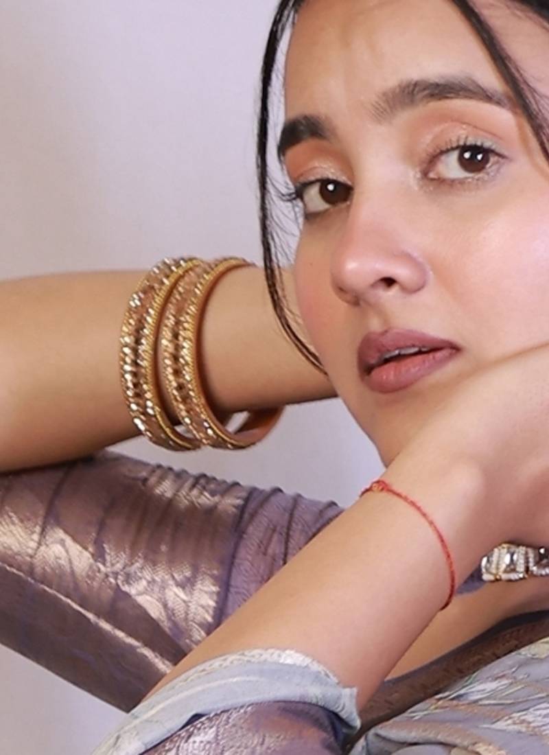 purple floral print zari woven border crepe saree with unstiched blouse piece