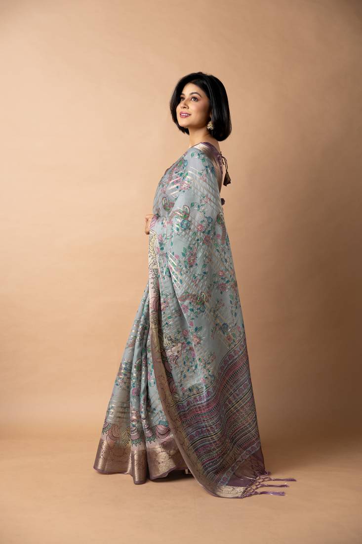 blue floral print zari woven border crepe saree with unstiched blouse piece