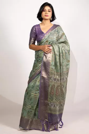 green floral print zari woven border crepe saree with unstiched blouse piece