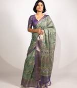 green floral print zari woven border crepe saree with unstiched blouse piece