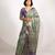 green floral print zari woven border crepe saree with unstiched blouse piece