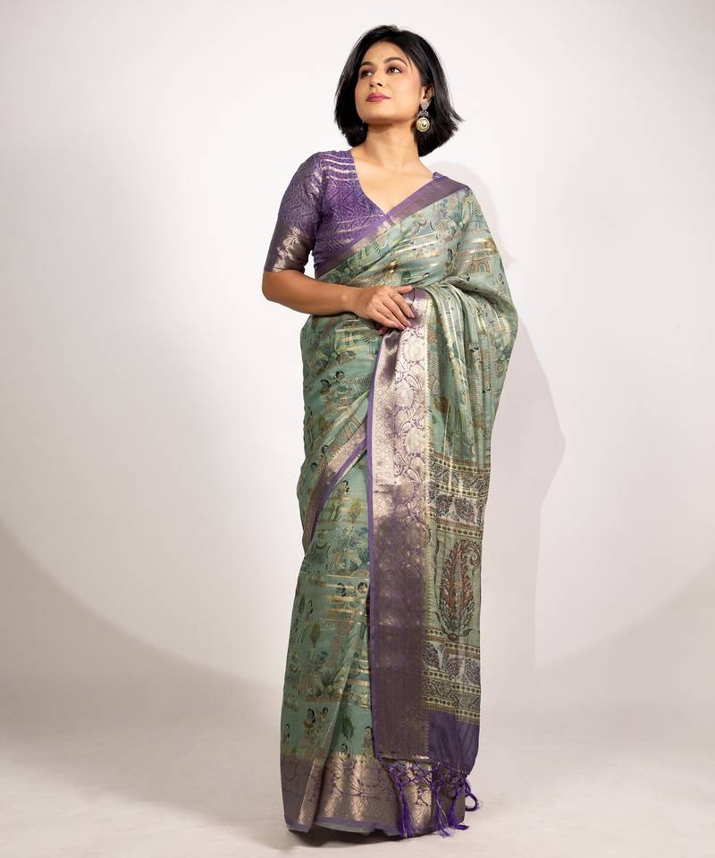 green floral print zari woven border crepe saree with unstiched blouse piece