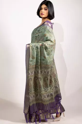 green floral print zari woven border crepe saree with unstiched blouse piece