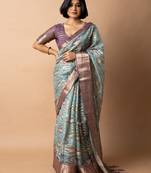 teal floral print zari woven border crepe saree with unstiched blouse piece