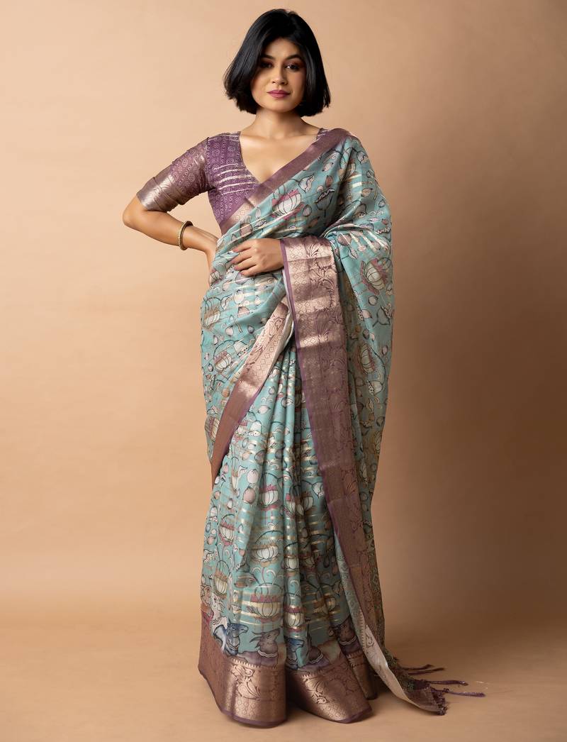 teal floral print zari woven border crepe saree with unstiched blouse piece